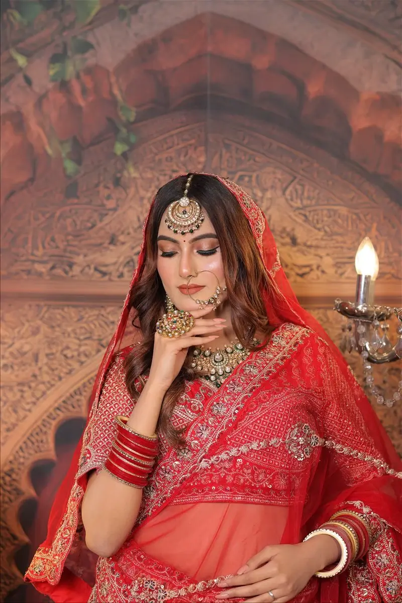 Close-up detail of bridal eye makeup and jewellery