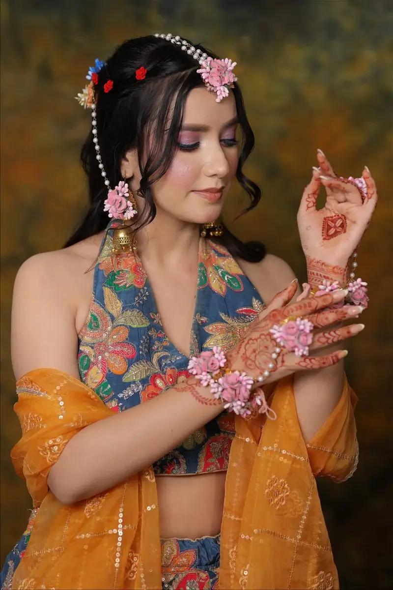 Haldi and Mehendi look with floral jewellery